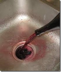 pouring wine down the drain