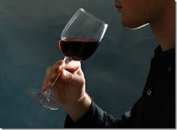 perons enjoying wine